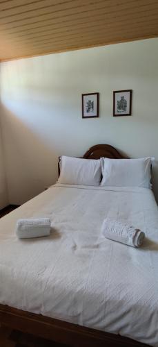 Uma cama ou camas num quarto em Sotão da Avó T2