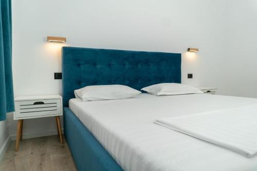 Un pat sau paturi într-o cameră la Havana Resort