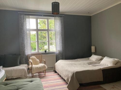 Postel nebo postele na pokoji v ubytování Scandinavian Style Wooden House Flat