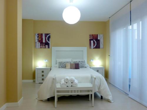 Postel nebo postele na pokoji v ubytování Casa Valdevaqueros