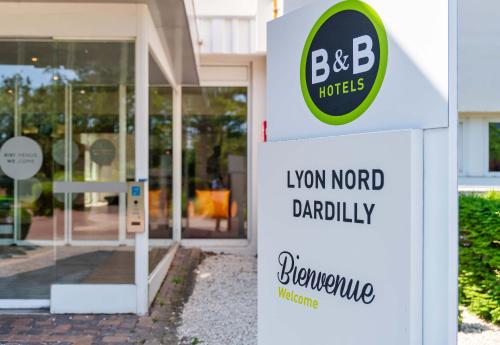 a sign for a lownornornornornornornornornornorord at B&B HOTEL Lyon Nord 4 étoiles in Dardilly