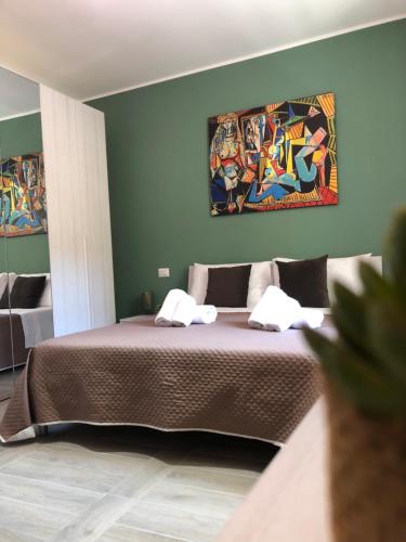 מיטה או מיטות בחדר ב-Casa Vacanze SANGALLO