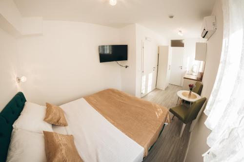 Elegant Studio Apartments Lastaにあるベッド