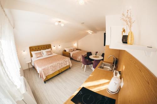 Elegant Studio Apartments Lastaにあるベッド