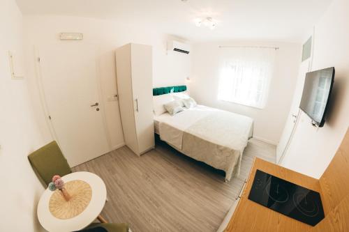 Elegant Studio Apartments Lastaにあるベッド