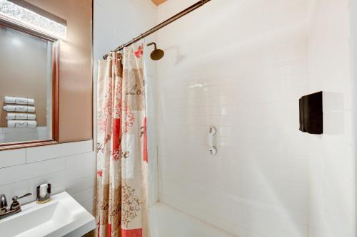 a bathroom with a shower and a sink at Harrisburg Hideaway with Yard about 2 Mi to Downtown in Harrisburg