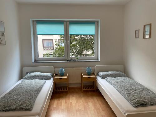 Ένα ή περισσότερα κρεβάτια σε δωμάτιο στο Apartment Nordseeküste