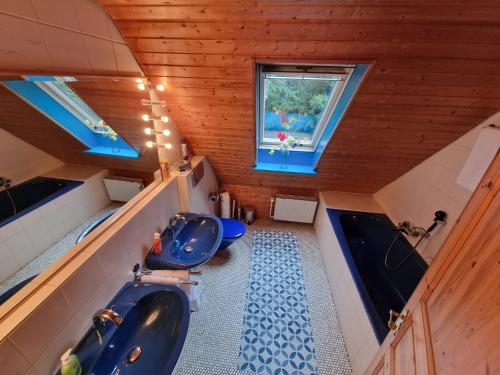 Posezení v ubytování Ferienhaus Thymian in Hatten bei Oldenburg - Idyllische Waldlage