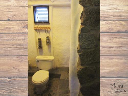 two pictures of a bathroom with a toilet and a window at Las Cabañas de Tarii in Cieneguilla