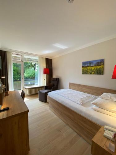 Postel nebo postele na pokoji v ubytování Hotel Sonnenhügel