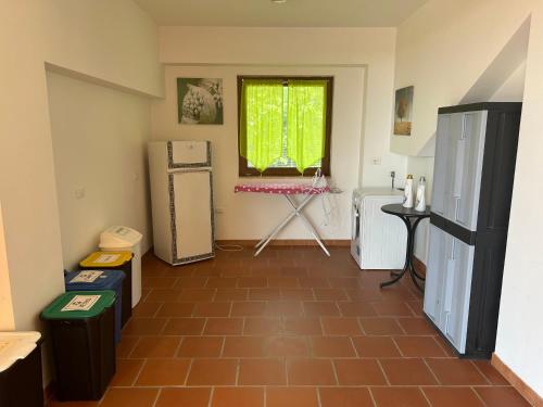 Kuchyň nebo kuchyňský kout v ubytování B&B Le Fravette