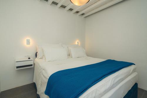 Ένα ή περισσότερα κρεβάτια σε δωμάτιο στο Loukia Apartments