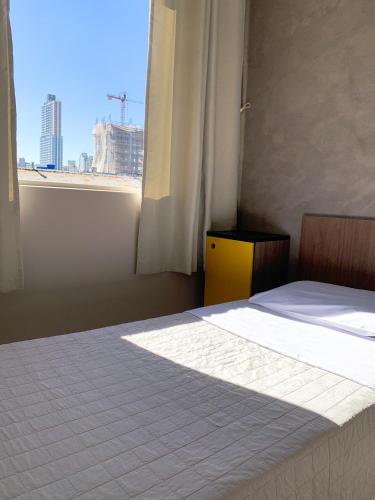 Hotel Idealにあるベッド