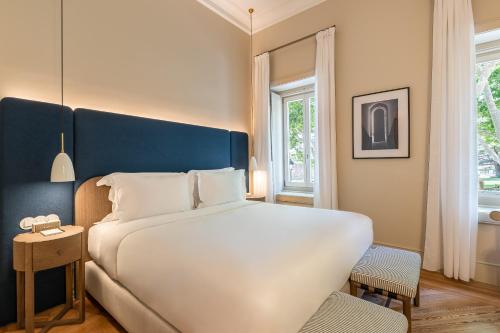 Cama ou camas em um quarto em Artsy Cascais