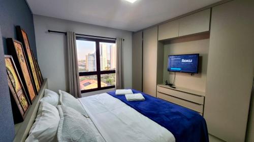 Posteľ alebo postele v izbe v ubytovaní Estúdio com Quarto Privativo, TV e Cama Super King
