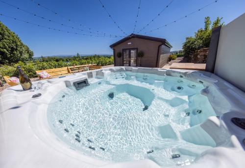 a hot tub with ice on top of a house at The Farmhouse, Sebergham, near Caldbeck in Sebergham