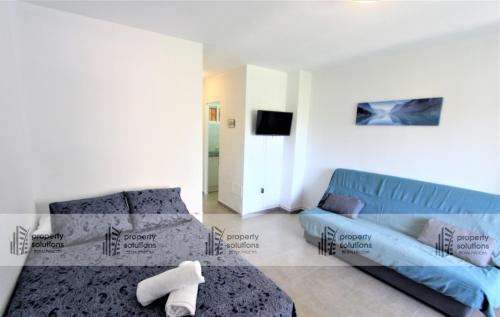 135 Ágata Apartamentos. Piscina y Playa. A corta distancia del centro.