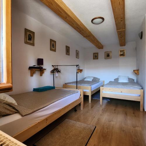 Postel nebo postele na pokoji v ubytování Fácán-Lak