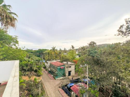 an overhead view of a building in a forest at ITH Sayulita Amazing Surf Hostel in Sayulita
