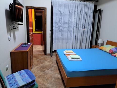 Cama o camas de una habitación en Marko Apartments