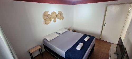 Кровать или кровати в номере Pousada Santiago Morumbi