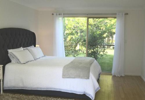 เตียงในห้องที่ Belle Vue Cottage - East Toowoomba