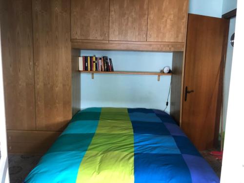 Ένα ή περισσότερα κρεβάτια σε δωμάτιο στο La Mansarda del cuore