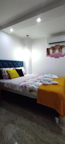 Postel nebo postele na pokoji v ubytování Apartmani Simić