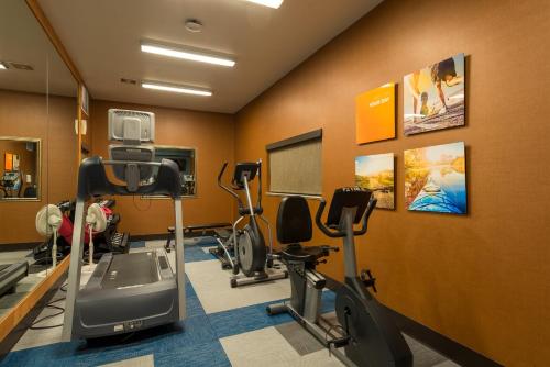 a gym with cardio equipment in a hotel room at Comfort Inn & Suites Alamosa in Alamosa