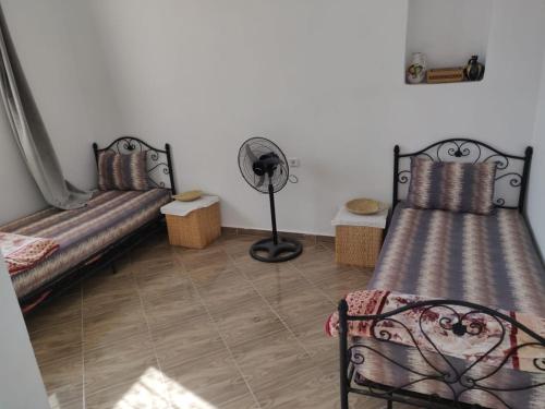 En eller flere senger på et rom på Villa Zaouia