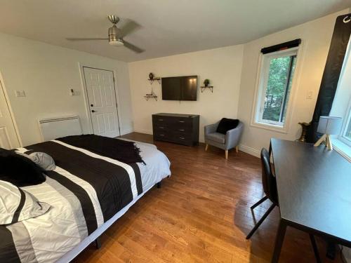 Letto o letti in una camera di Évadez-vous vers le Nord à Mille-Isles