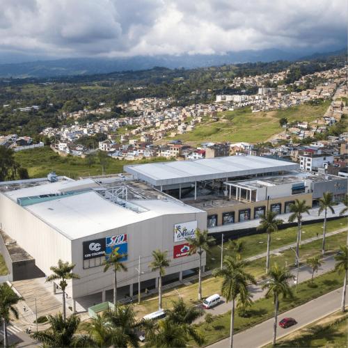 an aerial view of a building with palm trees at Tranquilo y Acogedor Apto en Fusagasugá. in Fusagasuga