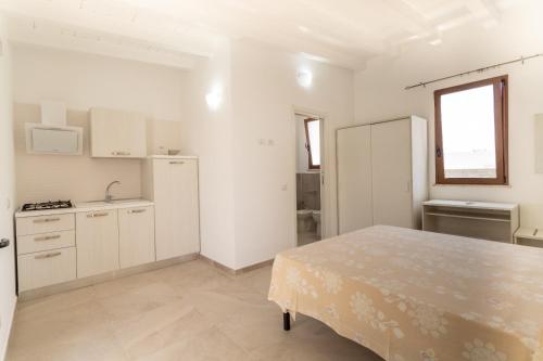 Кухня или мини-кухня в Appartamenti Costanza
