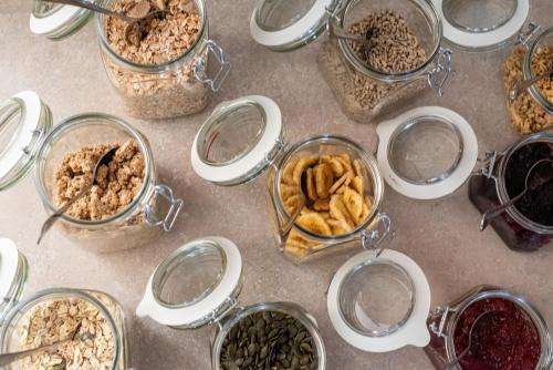 a group of jars filled with different types of food at Penzion Golf Luby in Luby