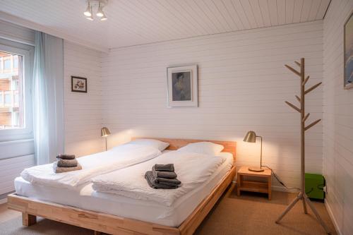 Ένα ή περισσότερα κρεβάτια σε δωμάτιο στο Chalet Tidu modern chic stylish