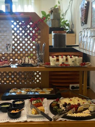 a buffet with many different types of food on display at Pension Rucksackpeter in Hohenbrugg an der Raab
