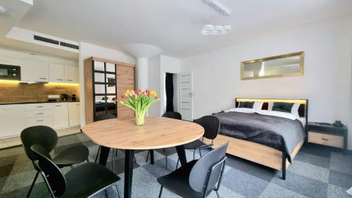 Кровать или кровати в номере NOOK NOOK Apartments Kazimierza Wielkiego 104