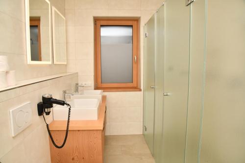 Phòng tắm tại Appartements neben der Gondelbahn - Haus Nord