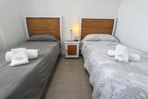 Postel nebo postele na pokoji v ubytování Ático frontal al mar en Duna Beach con vistas