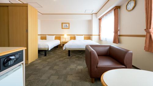 Letto o letti in una camera di Toyoko Inn Gumma Ota eki Minami guchi
