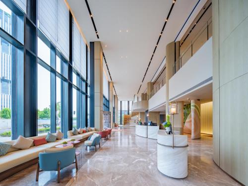 Χώρος καθιστικού στο EVEN Hotels Shanghai Expo by IHG