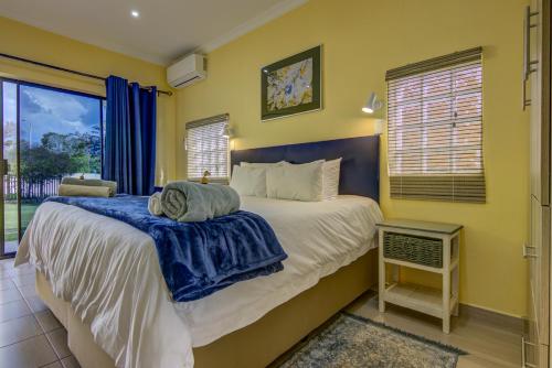 Un ou plusieurs lits dans un hébergement de l'établissement Edenvale Guest House