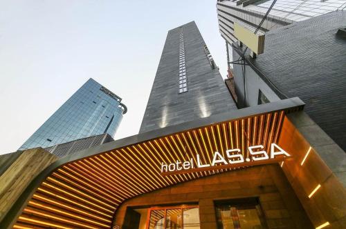 a hotel lasagna sign on the front of a building at Hotel Lassa in Seoul