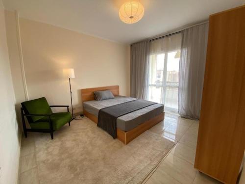 Postel nebo postele na pokoji v ubytování Madinaty Hotel