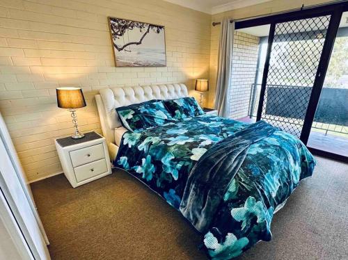 Ένα ή περισσότερα κρεβάτια σε δωμάτιο στο Cozy and Relaxed 2 Bedroom Apartment 1