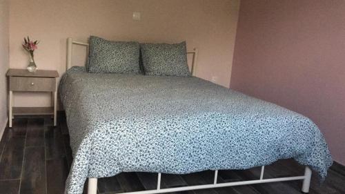Postel nebo postele na pokoji v ubytování NA House 2