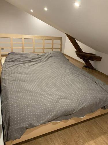A bed or beds in a room at Heart of city center