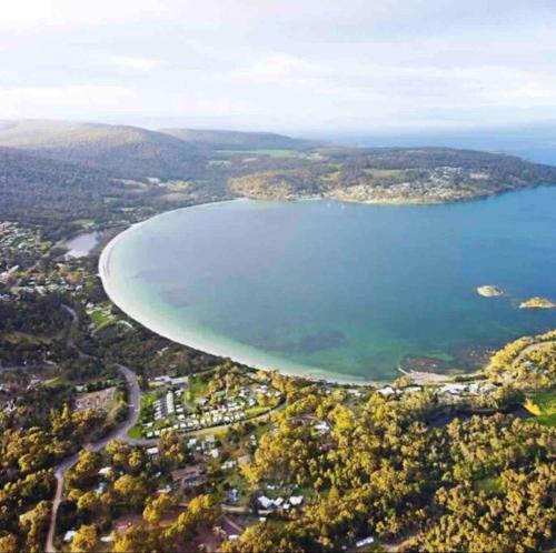 an aerial view of a large body of water at Beachfront self contained studio in White Beach