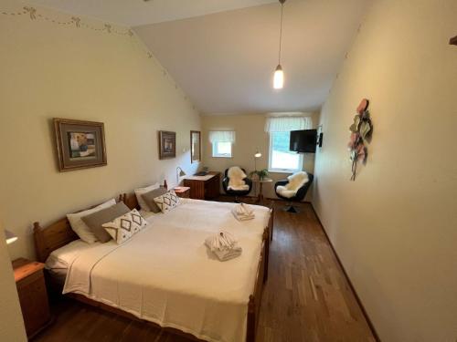 Postel nebo postele na pokoji v ubytování Hotel Fritza