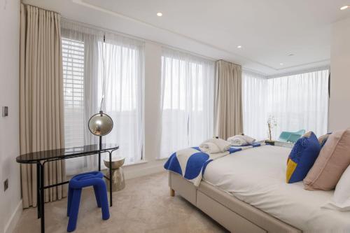 En eller flere senge i et værelse på Clifford's Skyline